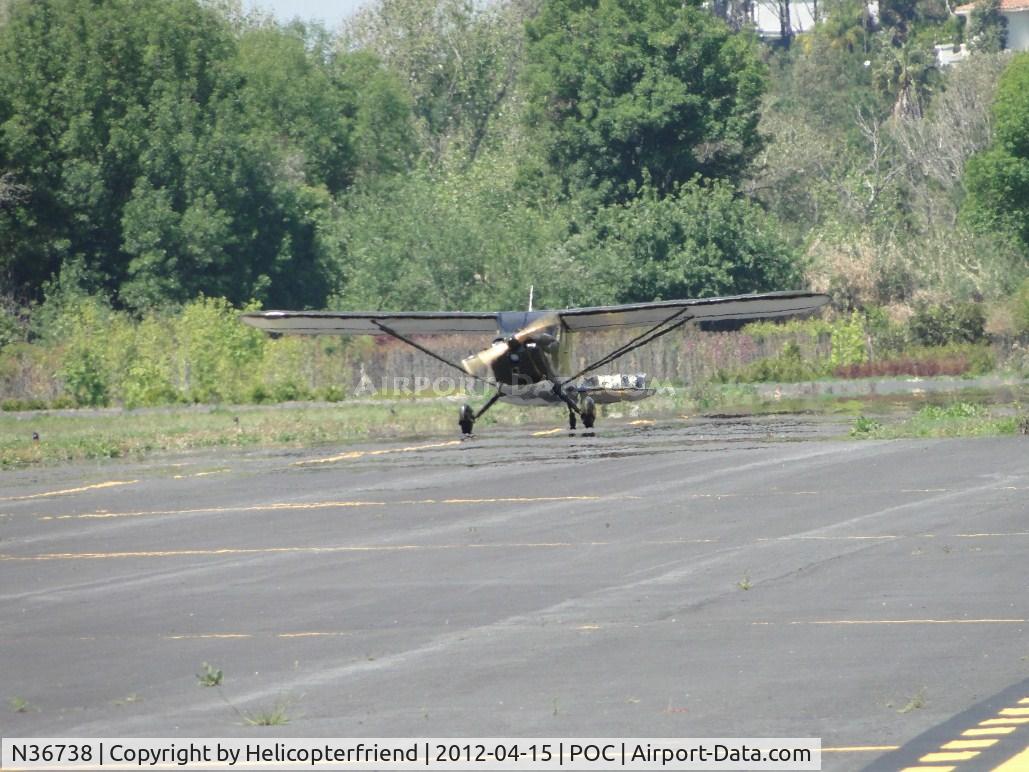 N36738, 1941 Stinson 10A C/N 8138, Taxiing on taxiway November
