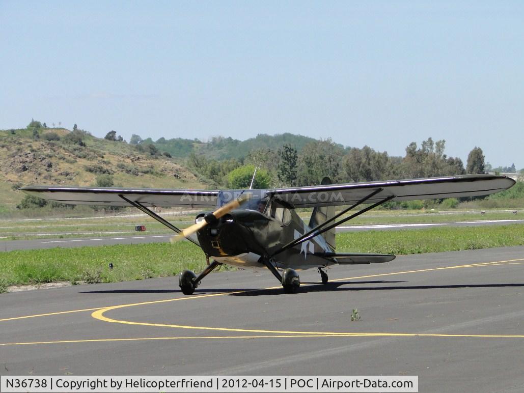 N36738, 1941 Stinson 10A C/N 8138, Approaching Taxiway Echo