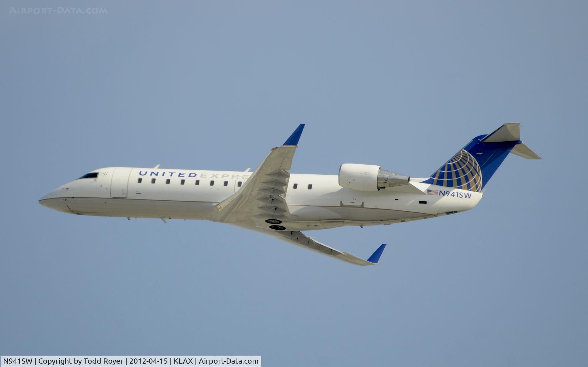 N941SW, 2003 Bombardier CRJ-200LR (CL-600-2B19) C/N 7750, Departing LAX on 25R