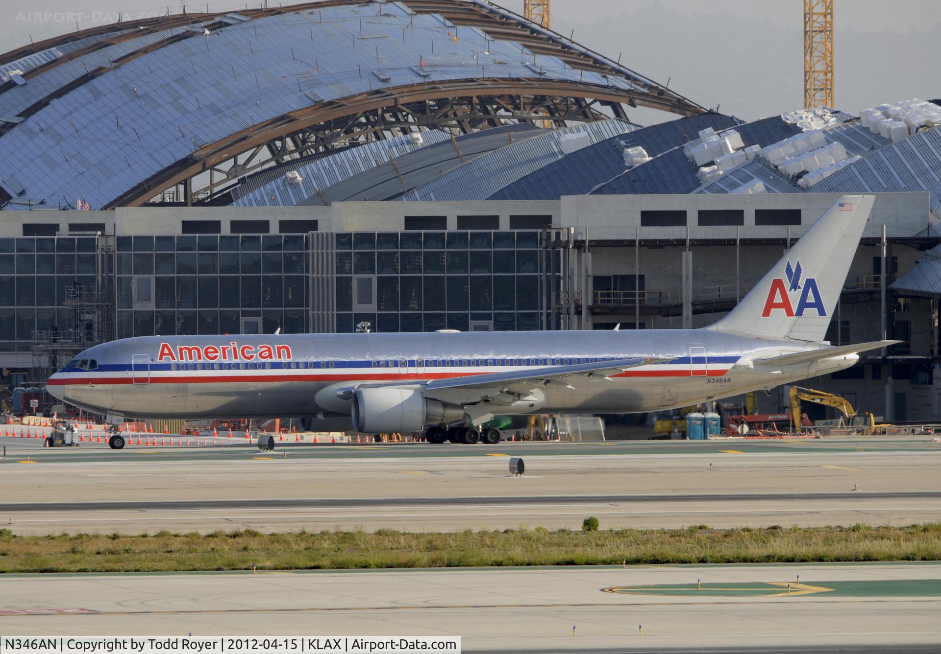 N346AN, 2003 Boeing 767-323 C/N 33085, Taxiing for departure at LAX