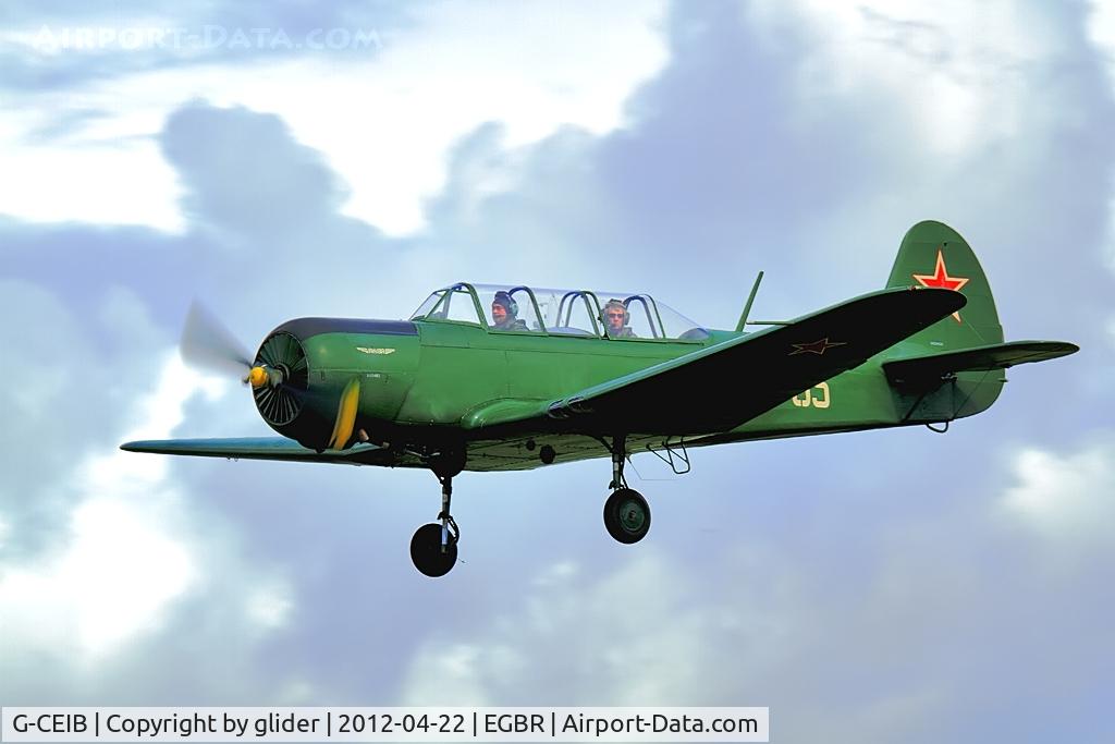 G-CEIB, 1958 Yakovlev Yak-18A C/N 1160403, Returning from an air to air photoshoot involving the ExtremeAir Sbach 342