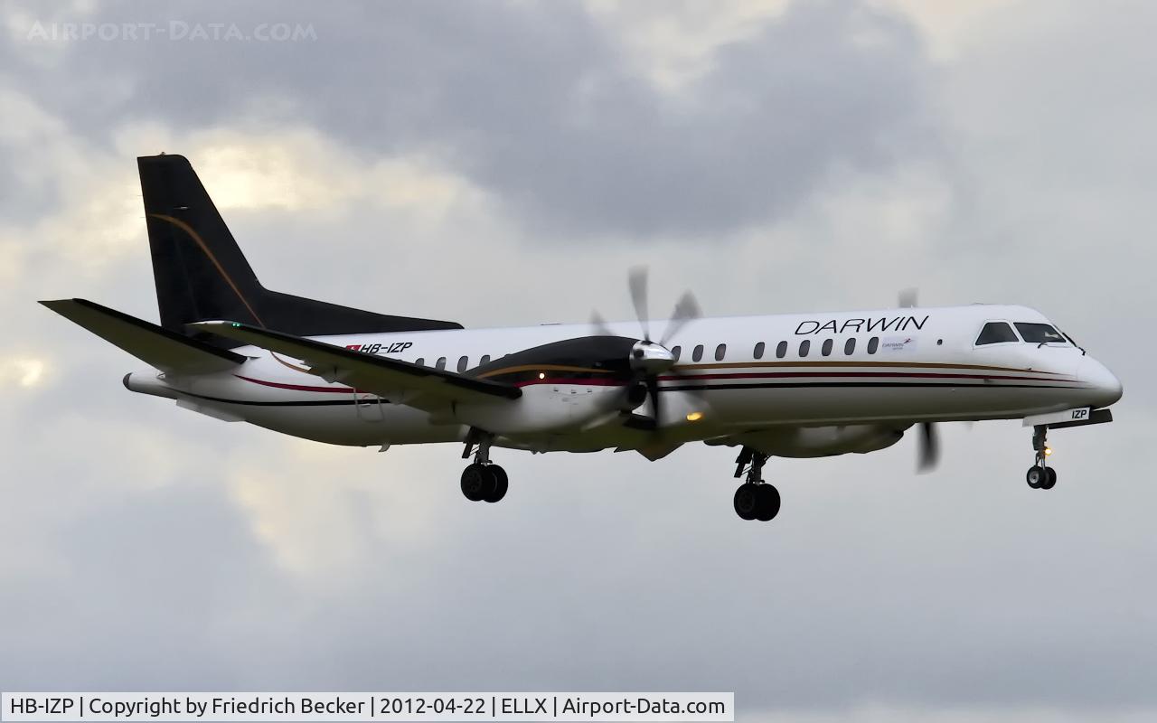 HB-IZP, 1996 Saab 2000 C/N 2000-031, on final RW24