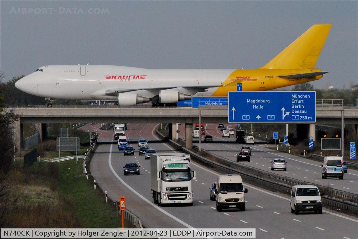 N740CK, 1989 Boeing 747-4H6 C/N 24405, Due to constuction works on rwy 26L this big bird has to take the long way to apron 4......