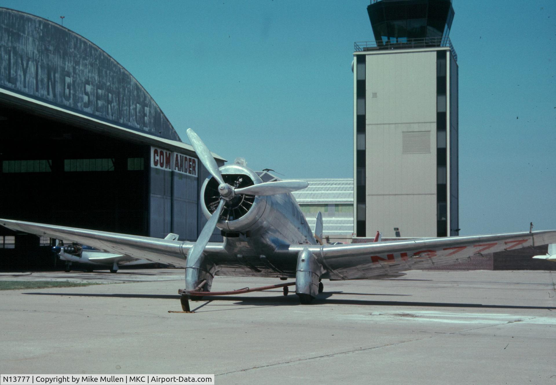 N13777, 1934 Northrop Delta 1D C/N 28, Aircraft was parked on the apron at MKC about 10-15 years ago when I was inspecting the airport and I took a photo of it.