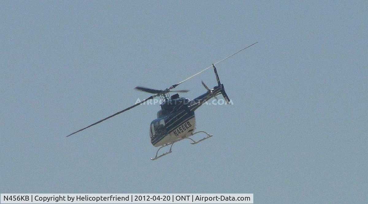 N456KB, 1997 Bell 407 C/N 53133, Lifted off from east of a hanger, went south and then turned east