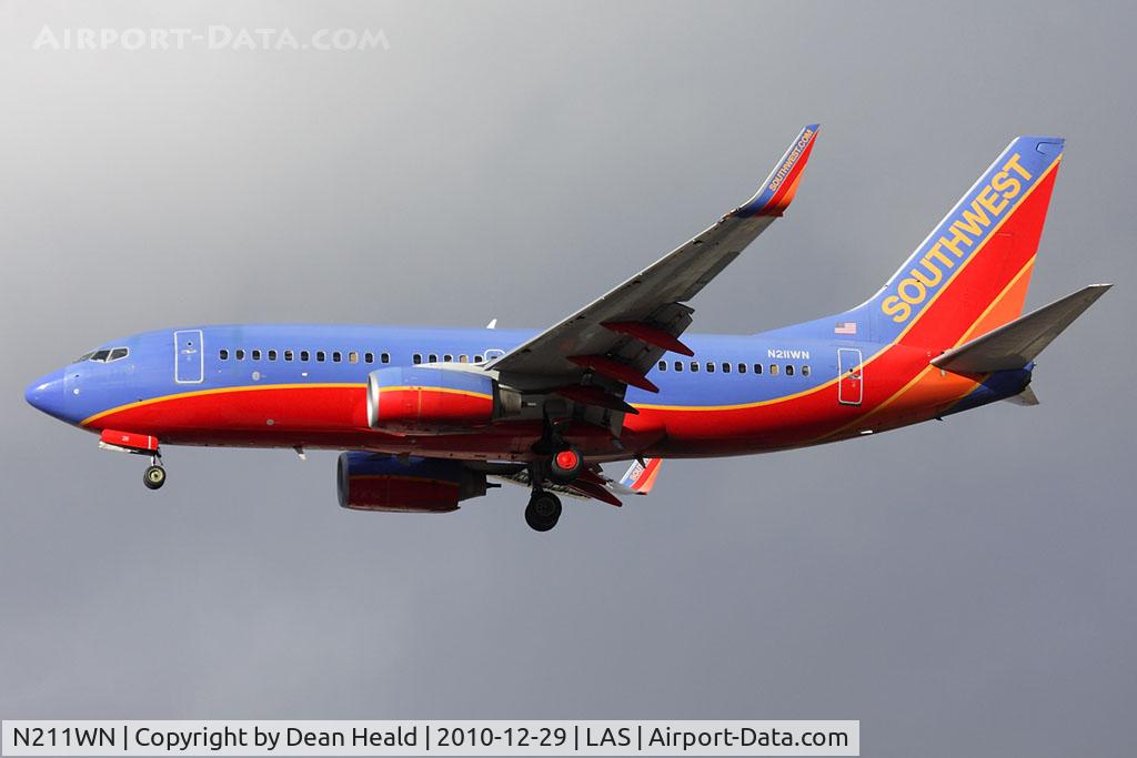 N211WN, 2005 Boeing 737-7H4 C/N 34163, Southwest Airlines N211WN (FLT SWA2378) from Orange County-Santa Ana John Wayne Airport (KSNA) on short final to RWY 25L.