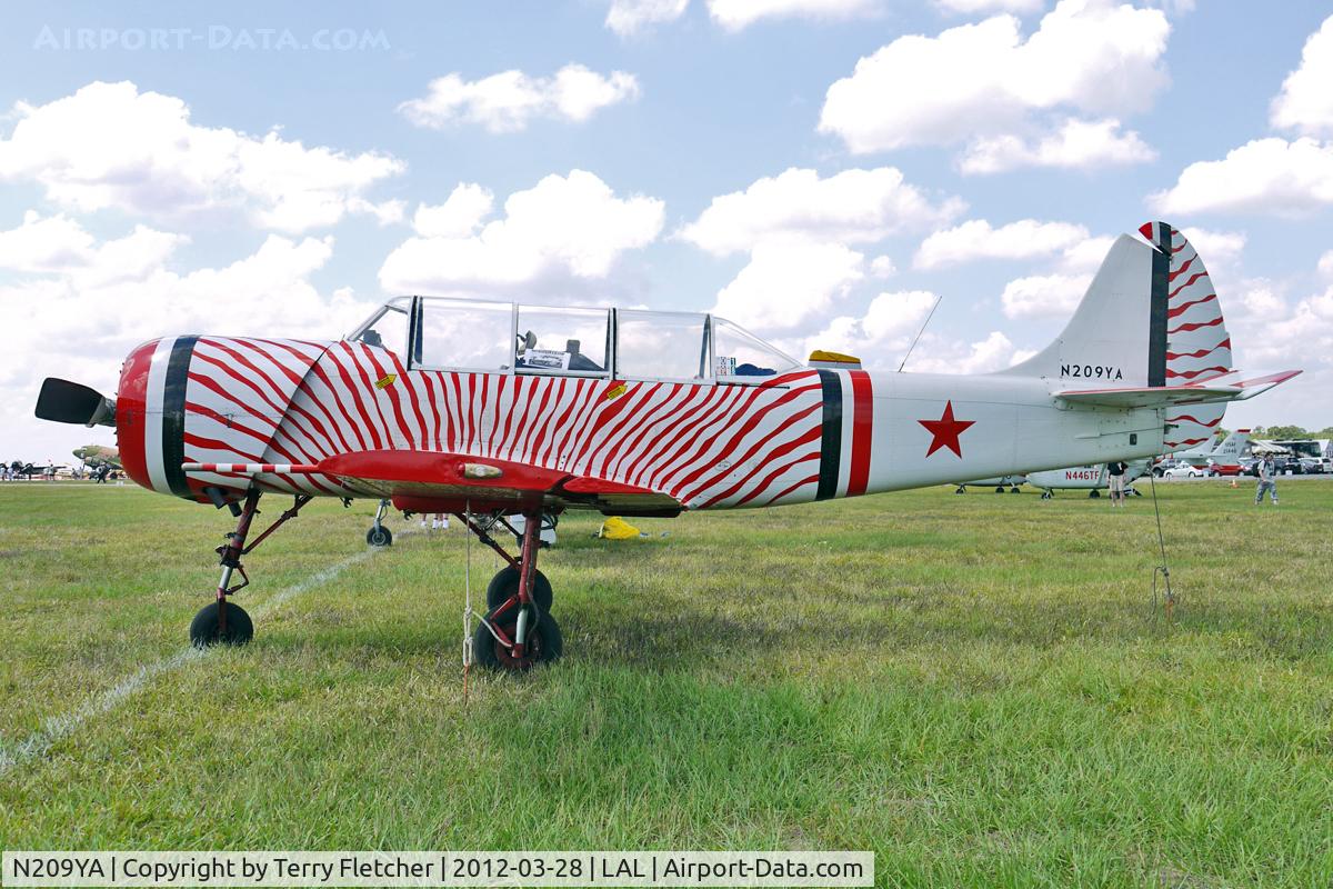N209YA, 1987 Yakovlev Yak-52 C/N 878009, At 2012 Sun N Fun