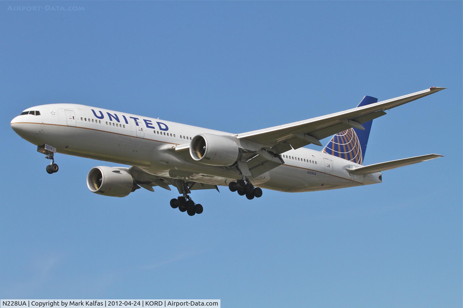 N228UA, 2002 Boeing 777-222 C/N 30556, United Airlines Boeing 777-222, UAL850 arriving from Beijing Capital Int'l/ZBAA, RWY 28 approach KORD.