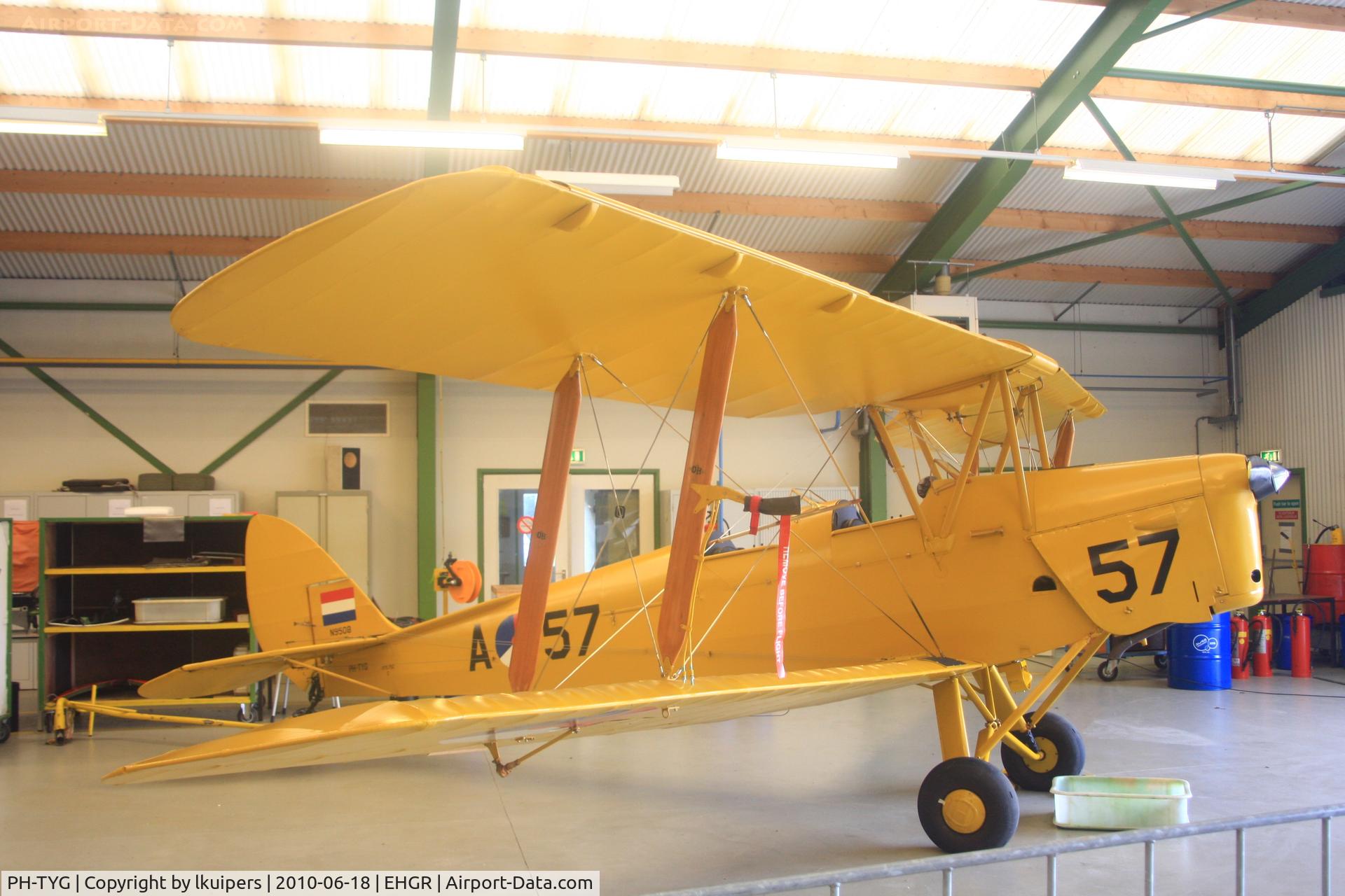 PH-TYG, De Havilland DH-82A Tiger Moth II C/N 82535, In the hangar of the Royal Netherlands Air Force Historical Flight at Gilze Rijen Airport on an Open Day.