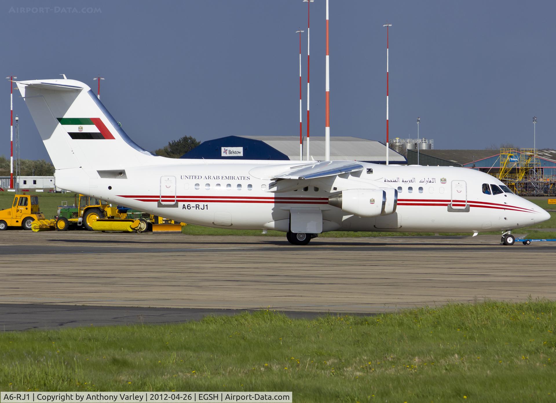 A6-RJ1, 1998 British Aerospace Avro 146-RJ85A C/N E2323, Being towed to KLM Engineering.