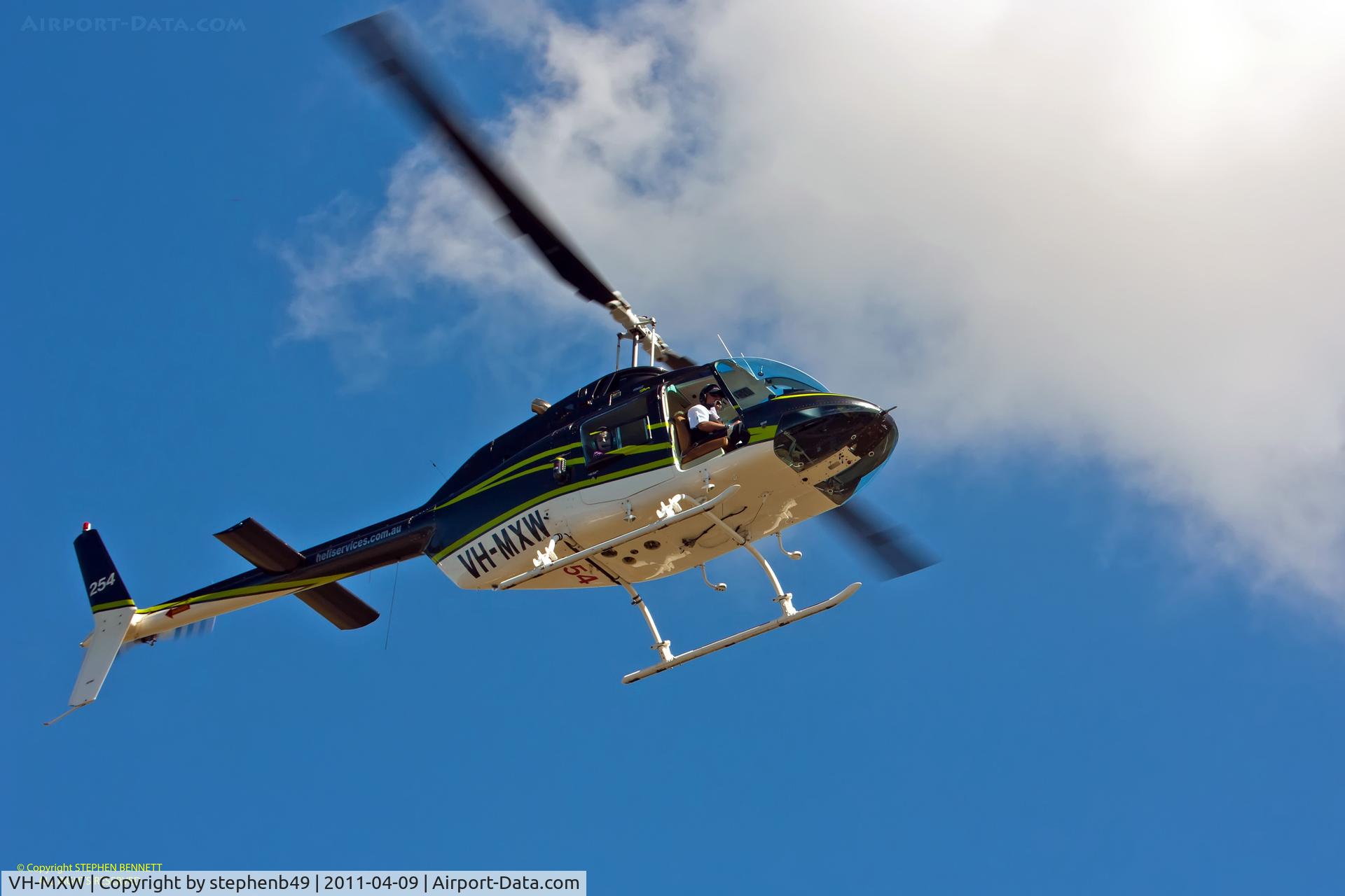 VH-MXW, 1974 Bell 206B JetRanger II C/N 1198, Taking off into a bright autumn sky Maitland NSW