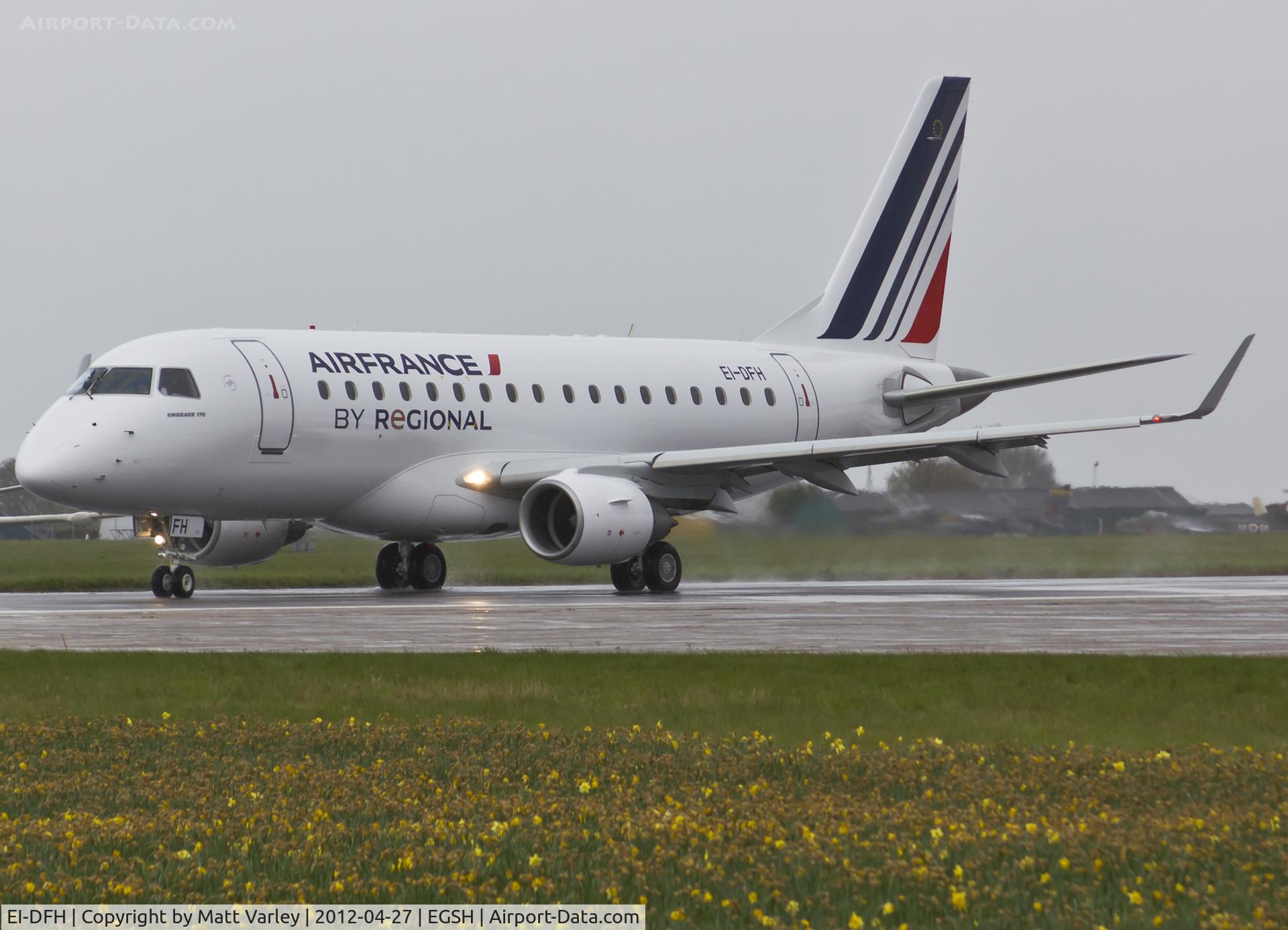 EI-DFH, 2004 Embraer 170LR (ERJ-170-100LR) C/N 17000009, About to depart a very wet EGSH after spray into AirFrance Regional C/S (to become F-HBXL)