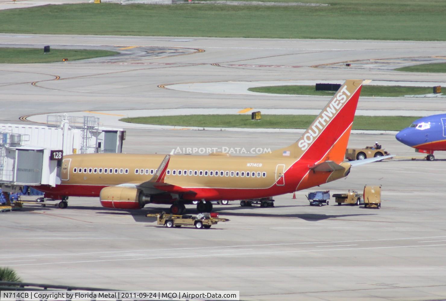 N714CB, 1998 Boeing 737-7H4 C/N 27848, Not sure if this plane just hasn't gotten around to getting painted or Southwest wants to have retro colors on one of them