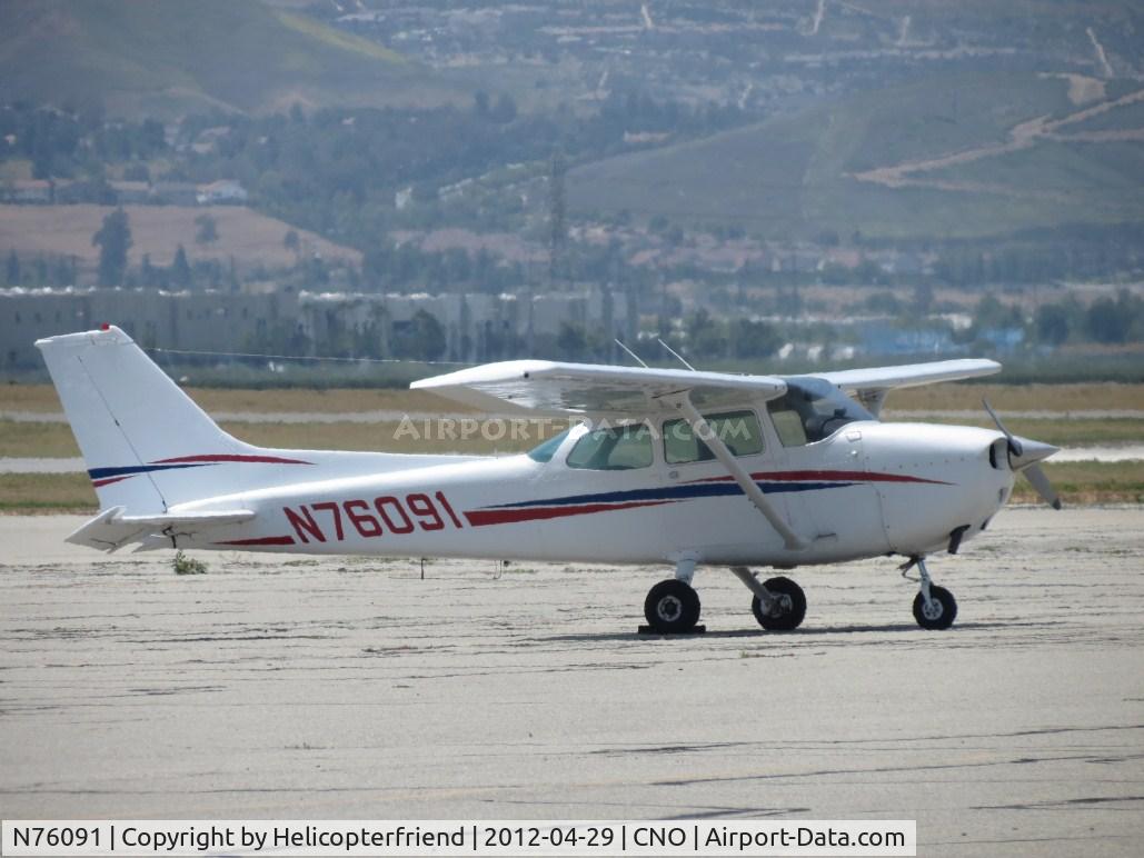 N76091, 1976 Cessna 172N C/N 17268121, Parked southwest of the Control Tower