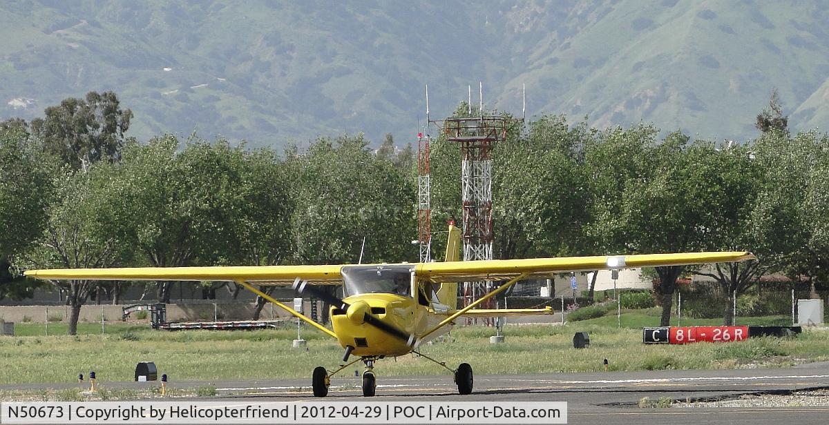 N50673, 1968 Cessna 150J C/N 15069477, Stopped on Cocco awaiting Ground Control permission to enter taxiway Sierra