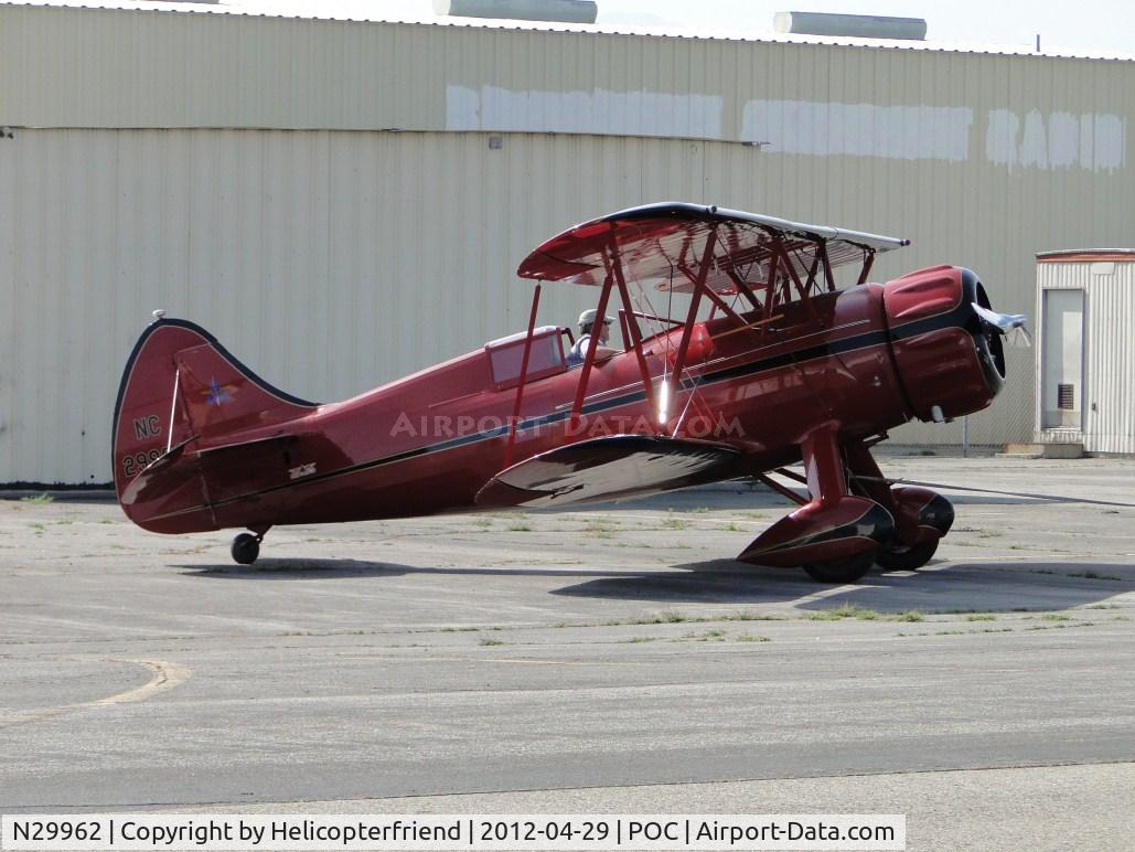 N29962, 1940 Waco UPF-7 C/N 5459, Being towed from a southside hanger area, after landing at the LA County Fair Grounds