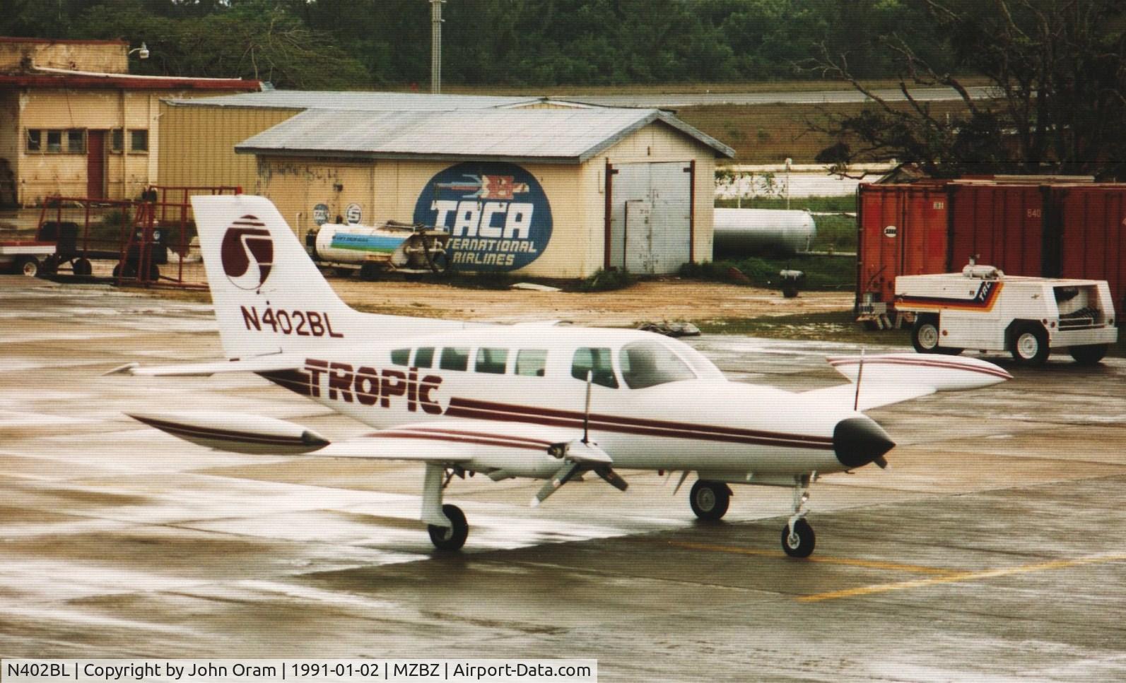 N402BL, Cessna 402B C/N 402B0827, Tropic Air C402 seen at Belize 2 January 1991