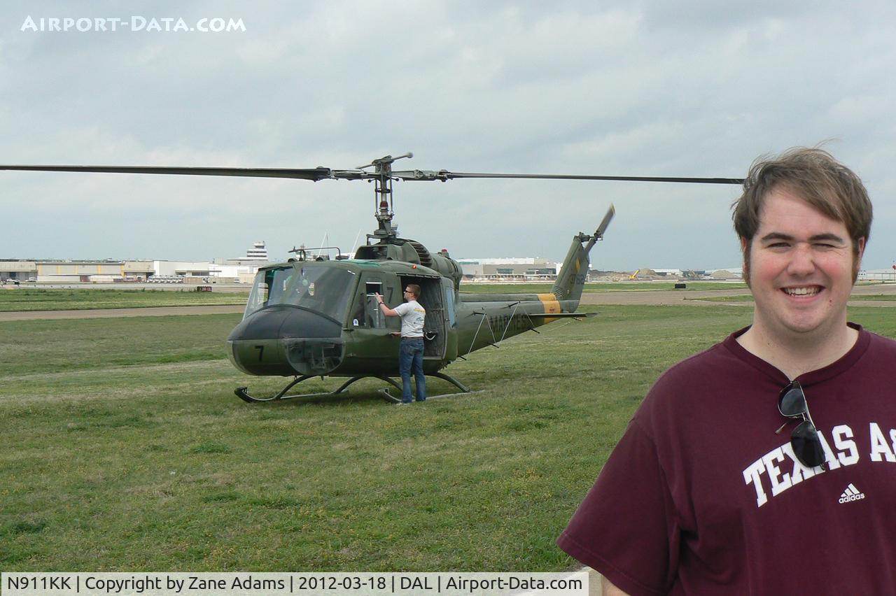 N911KK, 1966 Bell UH-1E Iroquois C/N 153762/6128, My Son got his first helicopter ride aboard the Collings Foundation UH-1E Huey for a flight from Dallas Love Field!! Woot he's looks happy!