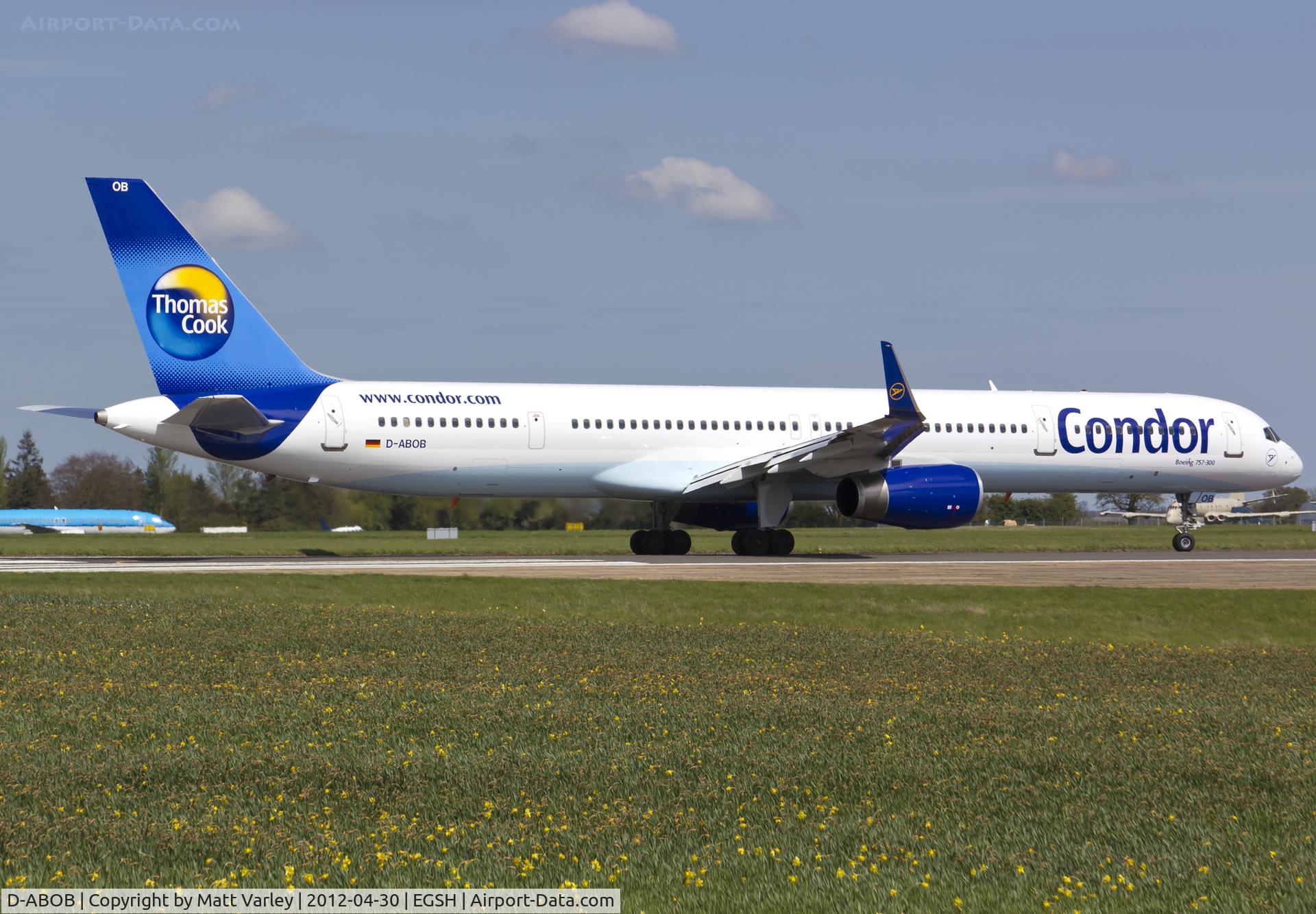 D-ABOB, 1998 Boeing 757-330 C/N 29017, Departing EGSH after spray by Air Livery.