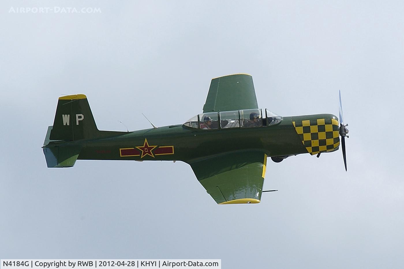 N4184G, Nanchang CJ-6A C/N 1332008, Banking over the crowd after takeoff.