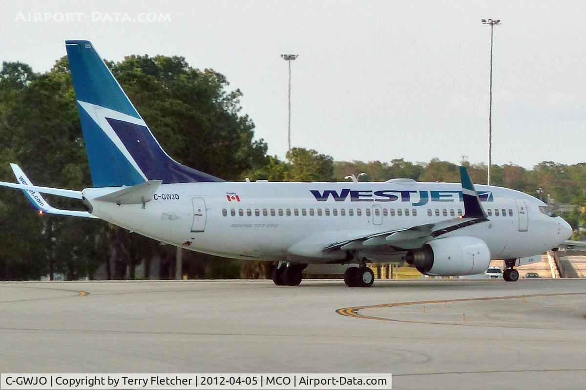 C-GWJO, 2004 Boeing 737-7CT C/N 33969, At Orlando International , Florida
