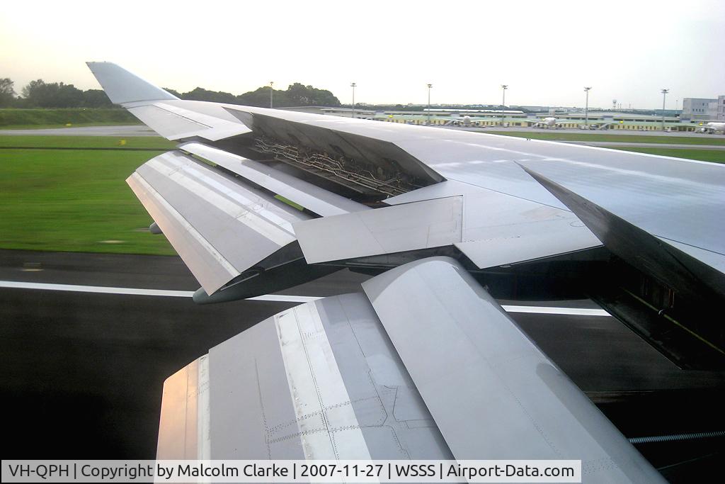 VH-QPH, 2005 Airbus A330-303 C/N 0695, Flaps engaged on landing. Airbus A330-303, Changi Airport, Singapore, November 2007.