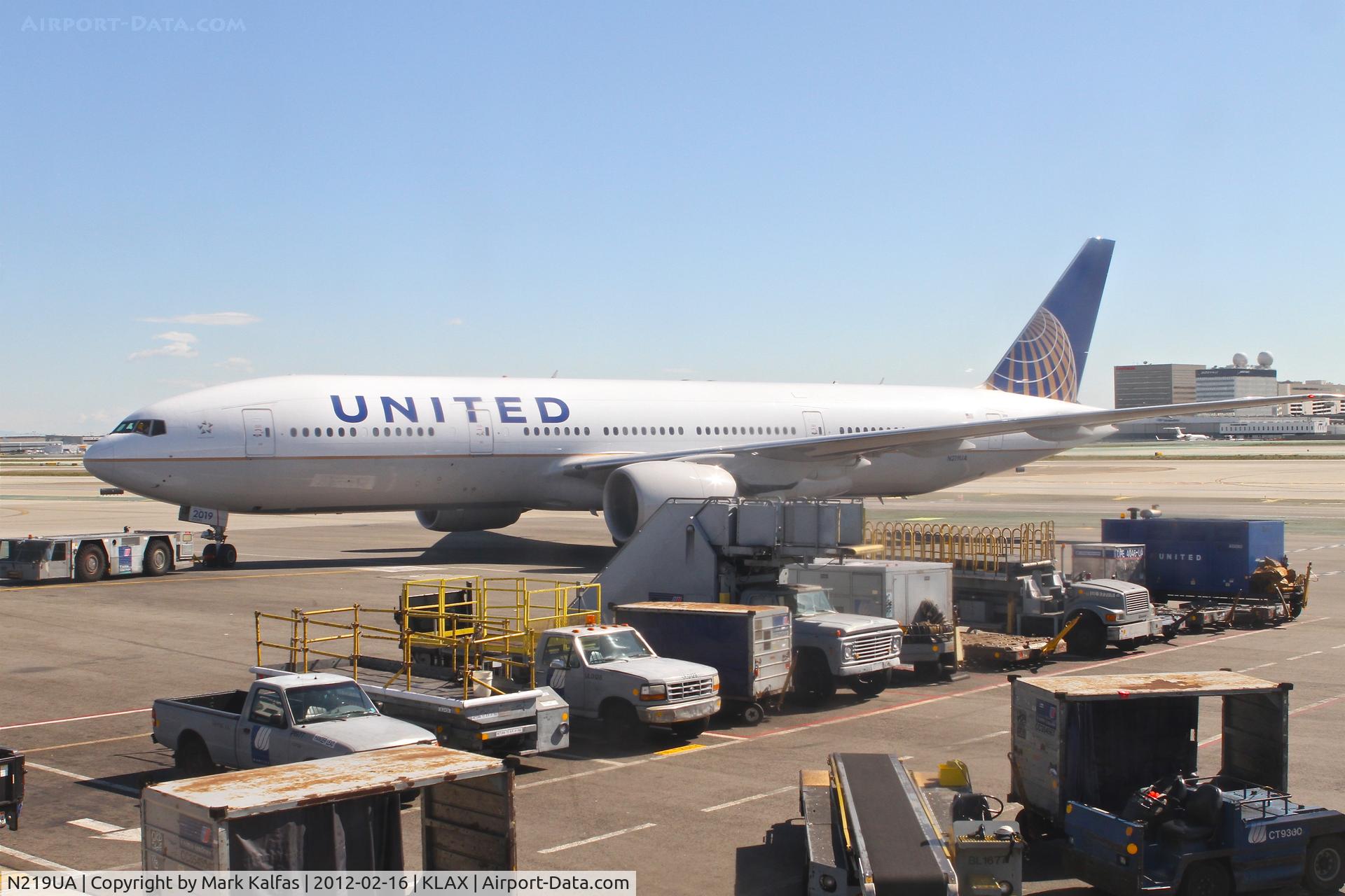 N219UA, 2001 Boeing 777-222 C/N 30551, United Airlines Boeing 777-222, UAL653 pushing back from gate 76 KLAX for a trip to KIAD.