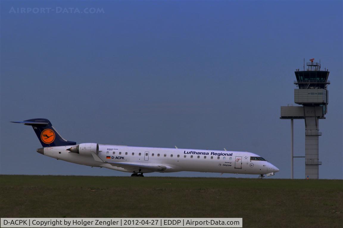 D-ACPK, 2002 Canadair CRJ-701ER (CL-600-2C10) Regional Jet C/N 10063, Crawling along taxiway Echo to rwy 26R.....