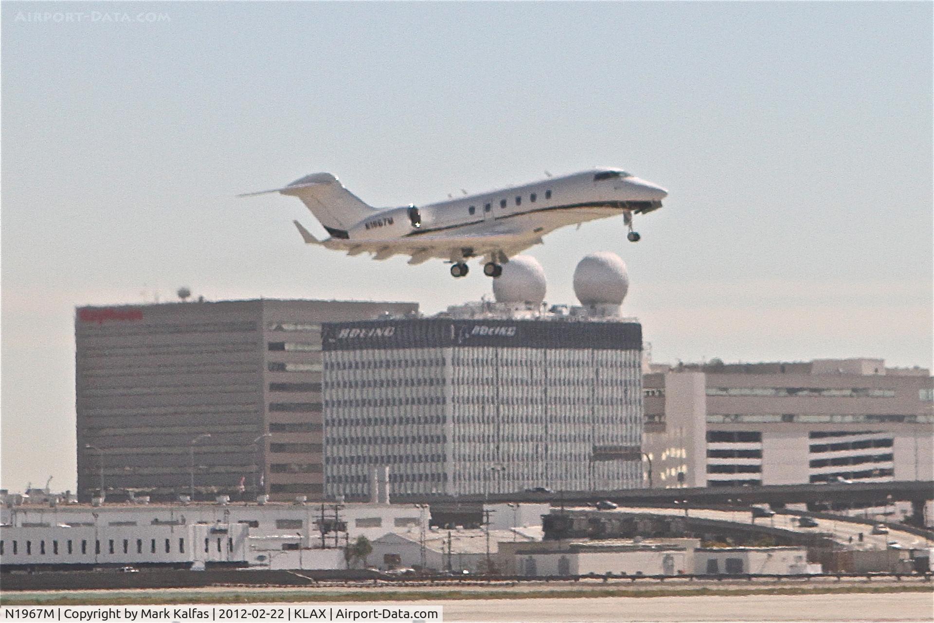 N1967M, 2005 Bombardier Challenger 300 (BD-100-1A10) C/N 20040, MCDONALDS CORP, Bombardier BD-100-1A10 departing RWY 25R KLAX en route to KDPA.