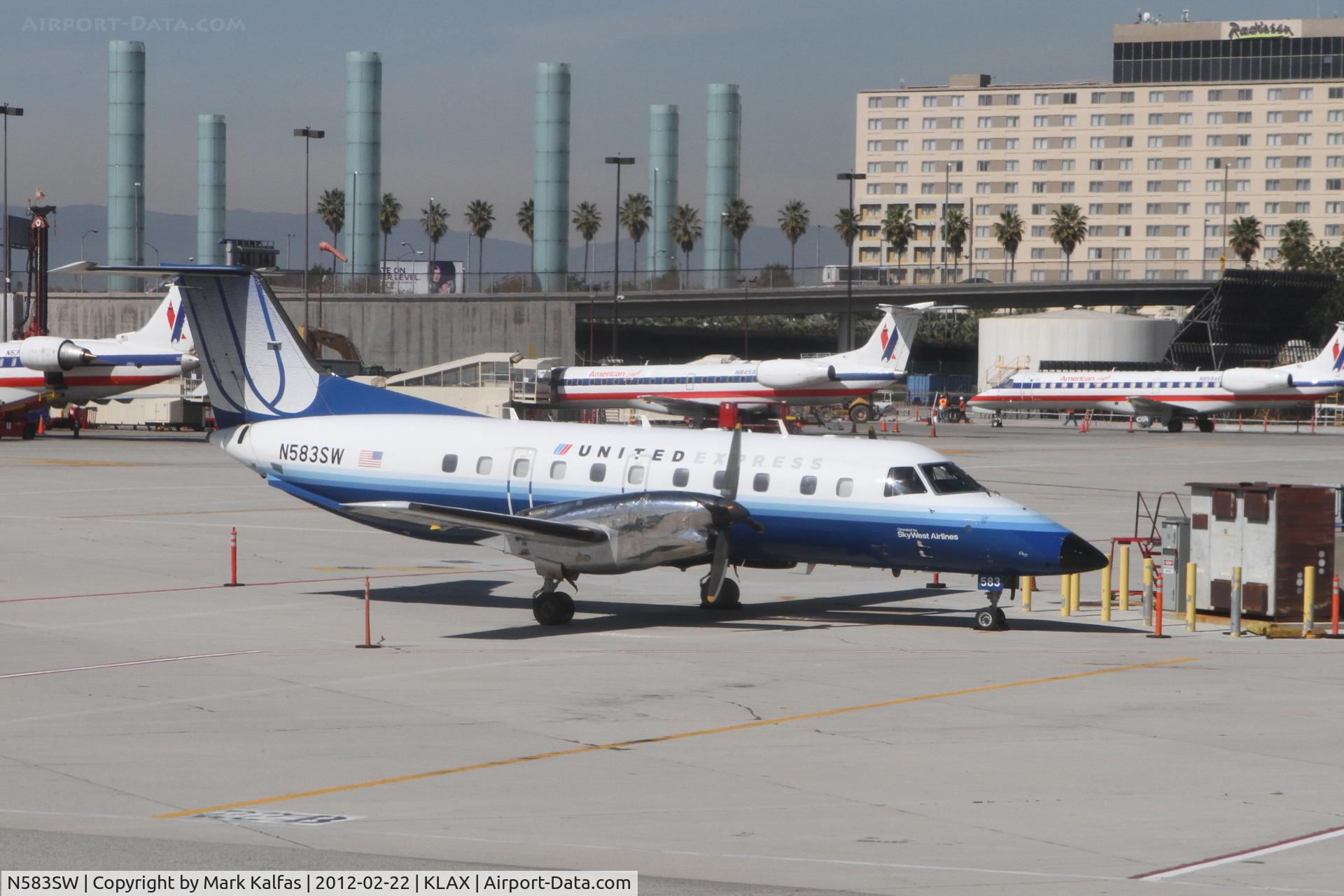 N583SW, 1999 Embraer EMB-120ER Brasilia C/N 120351, SkyWest/United Express Embraer EMB-120ER at LAX.
