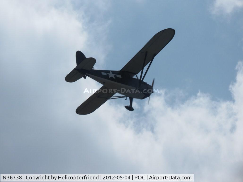 N36738, 1941 Stinson 10A C/N 8138, Heading into the broken overcast blue sky