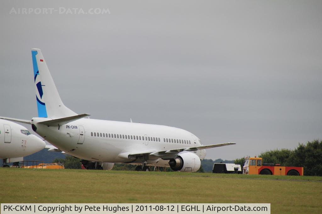 PK-CKM, 1996 Boeing 737-36M C/N 28333, Pk-CKM Boeing 737 seen at Lasham before delivery to Indonesia.  This aircraft was damaged in a poor weather landing accident in Indonesia in December 2011.