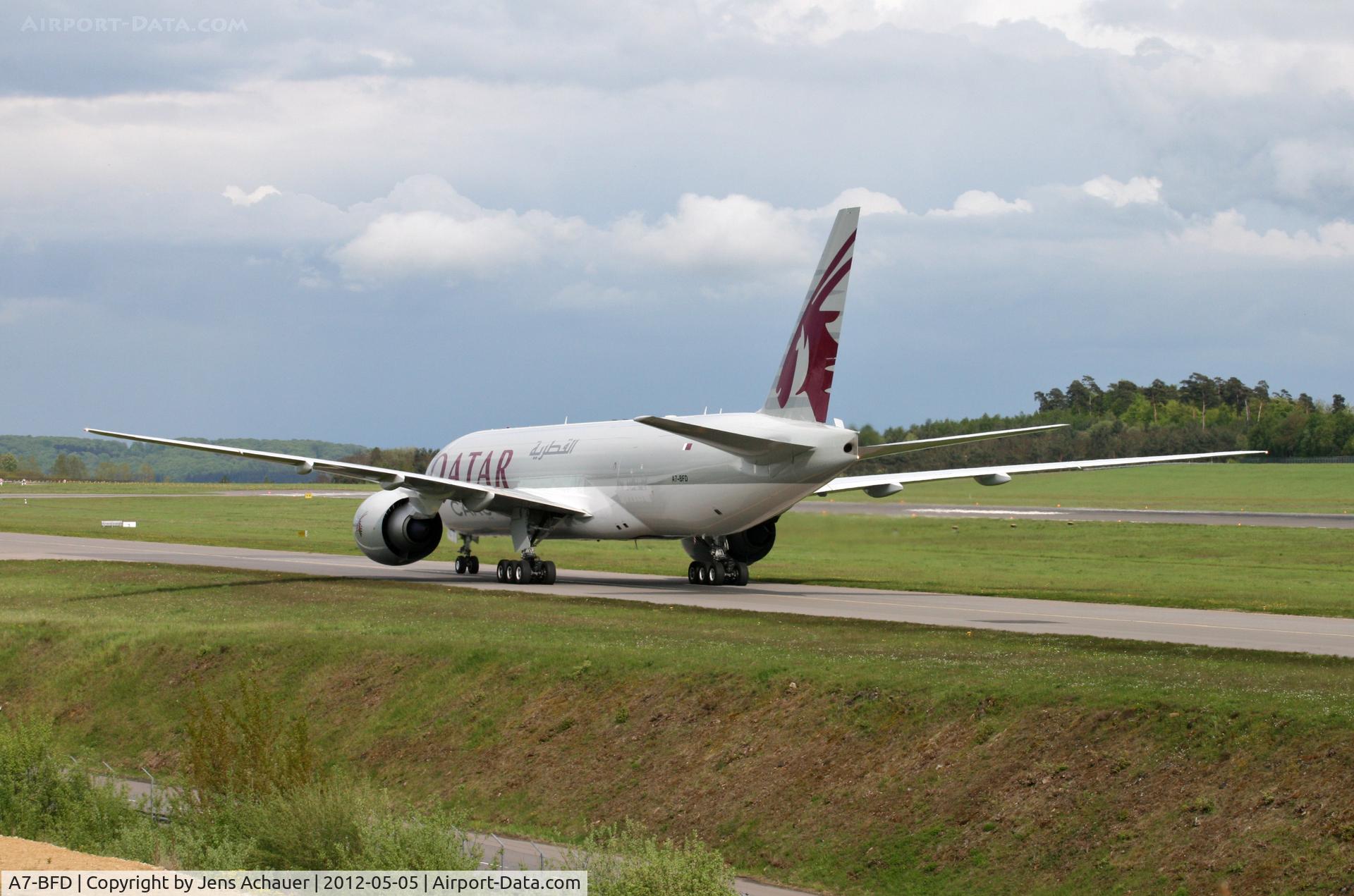 A7-BFD, 2012 Boeing 777-FDZ C/N 41427, Taxing to cargo ramp after landing on rwy 24