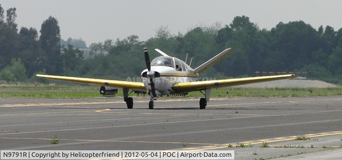 N9791R, 1960 Beech M35 Bonanza C/N D-6289, On taxiway November heading to 26R