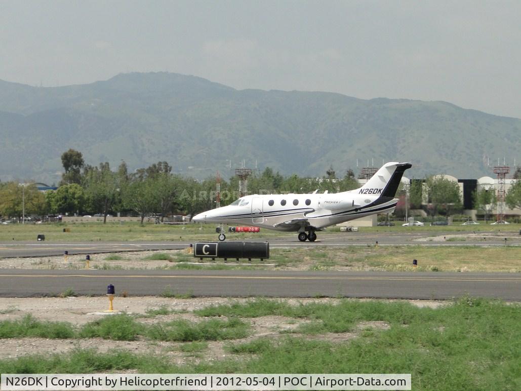 N26DK, 2008 Hawker Beechcraft Corp 390 C/N RB-226, Rolling westbound for take off from 26L
