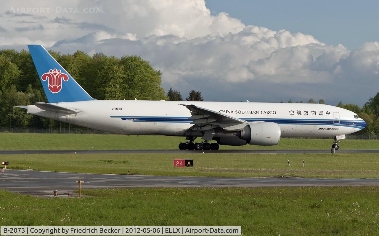 B-2073, 2009 Boeing 777-F1B C/N 37311, line up for departure