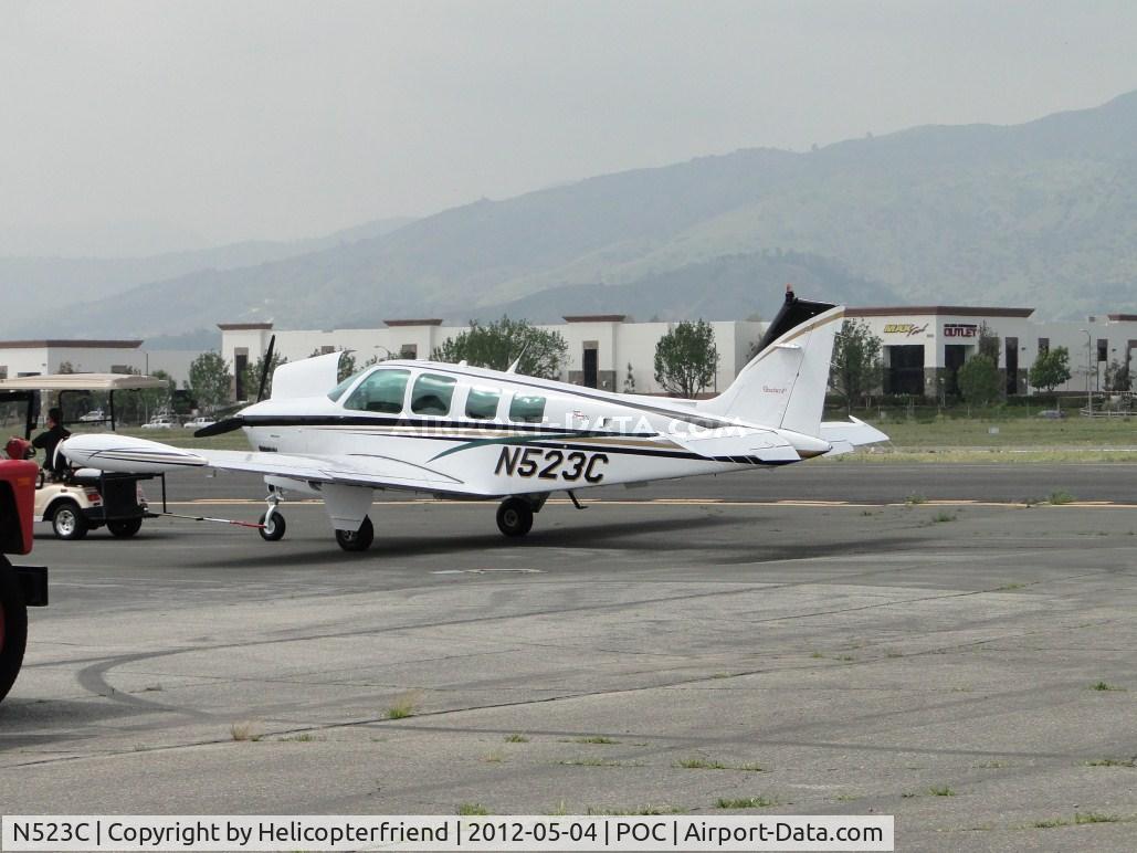 N523C, 1998 Raytheon Aircraft Company A36 Bonanza C/N E-3161, Being towed to the fuel station