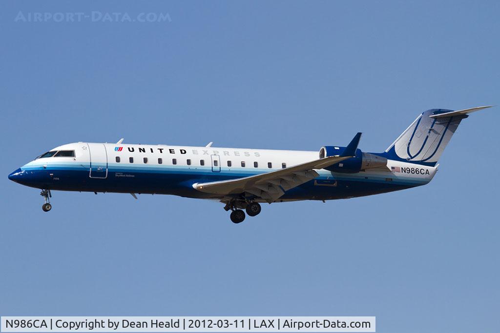 N986CA, Canadair CRJ-100ER (CL-600-2B19) C/N 7174, United Express (SkyWest Airlines) N986CA (FLT SKW6283) from Phoenix Sky Harbor Int'l (KPHX) on short final to RWY 25L.