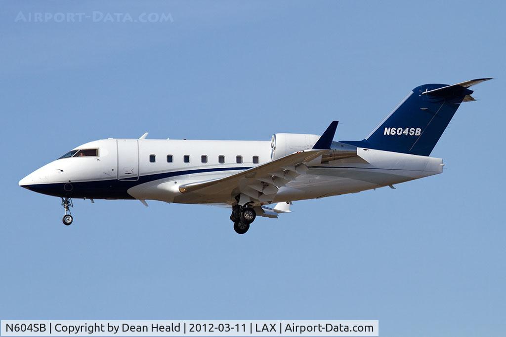 N604SB, 2004 Bombardier Challenger 604 (CL-600-2B16) C/N 5569, Registered with FAA as POLEAR Inc (owned by Paul Orfalea), this Bombardier Challenger 604 is operated by Santa Barbara Executive Jet, and is seen here on short final to RWY 25L.