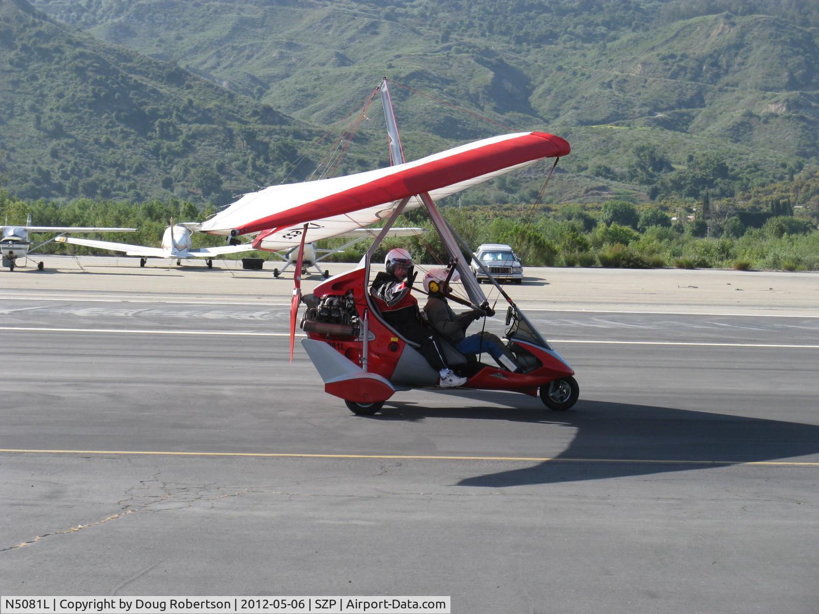 N5081L, 2006 Air Creation Tanarg C/N T06072, 2006 Air Creation TANARG weight-shift-control ultra-light trike, Rotax 912UL 80 Hp pusher, French design Experimental class, taxi after landing with big wave. Thanks, guys!