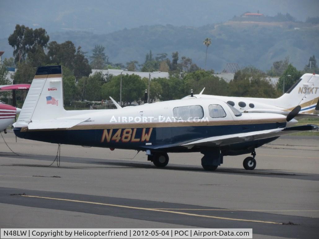 N48LW, 1998 Mooney M20K C/N 25-2021, Tied down, covered and parked in transient parking