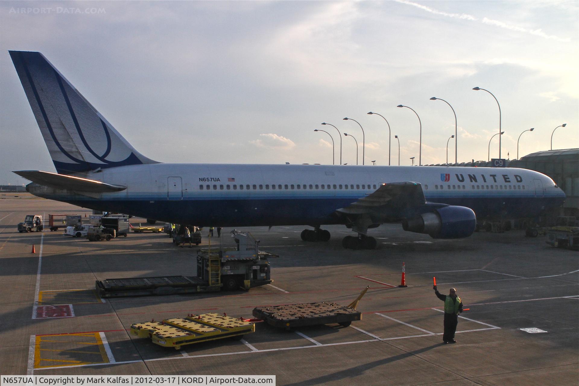 N657UA, 1993 Boeing 767-322 C/N 27112, United Airlines Boeing 767-322, UAL908 is loading for a trip to Amsterdam Schiphol/EHAM, gate C9 at KORD.