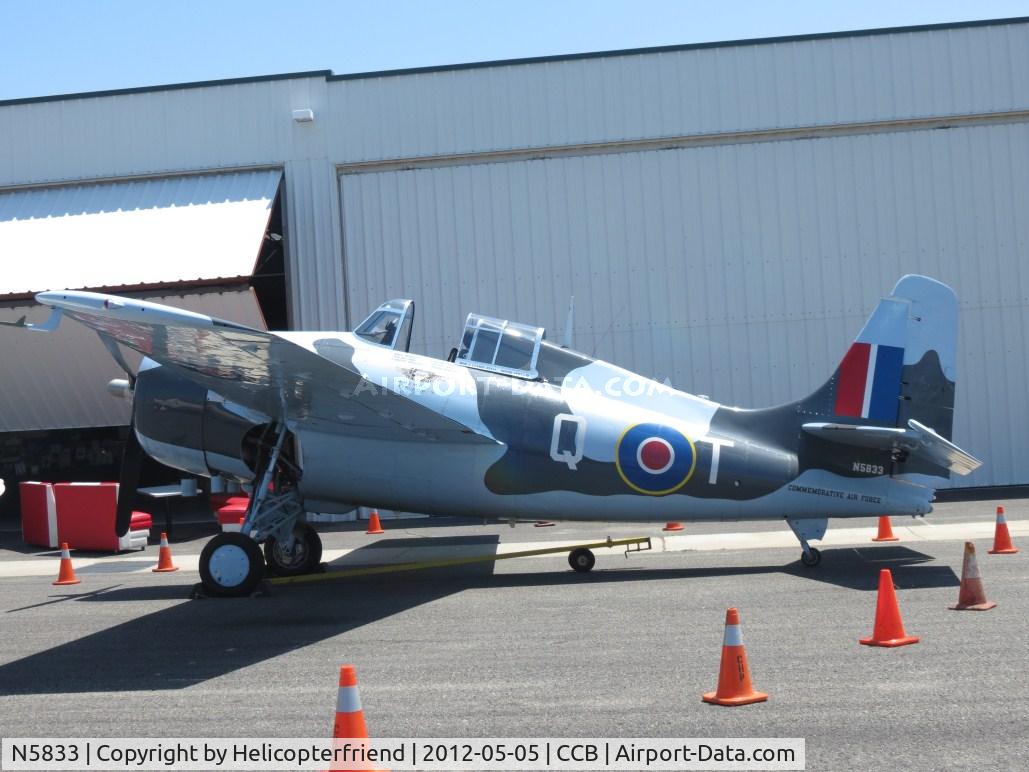 N5833, 1945 General Motors (Grumman) FM-2 Wildcat C/N 5833, Another ship parked for display and coned off for the great event