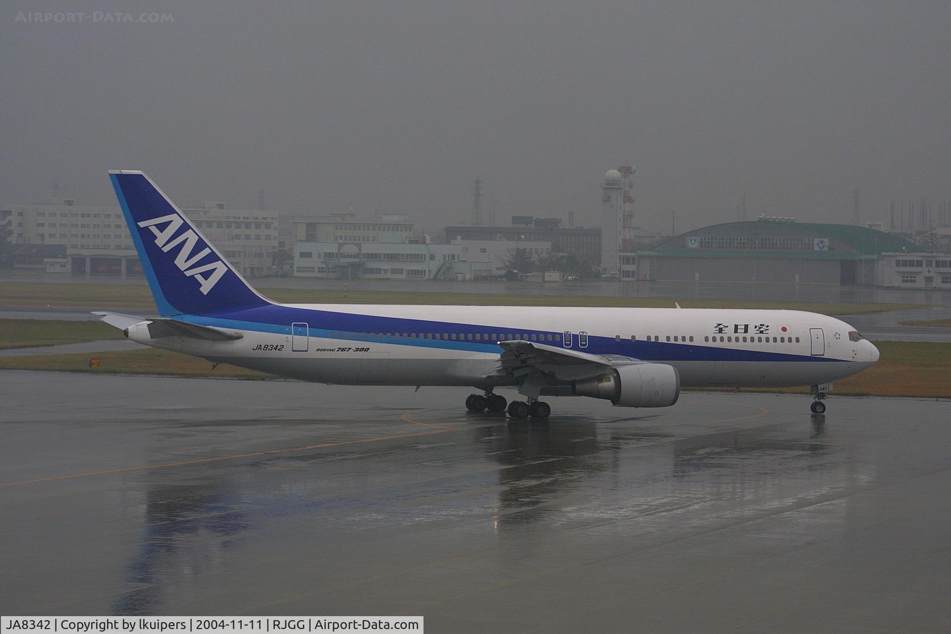 JA8342, 1995 Boeing 767-381 C/N 27445, On a rainy afternoon at Nagoya Komaki Airport