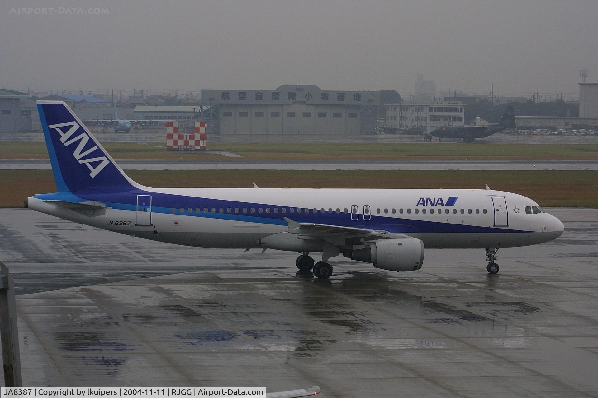 JA8387, 1991 Airbus A320-211 C/N 0196, At a rainy afternoon on Nagoya Komaki Airport in November 2004
