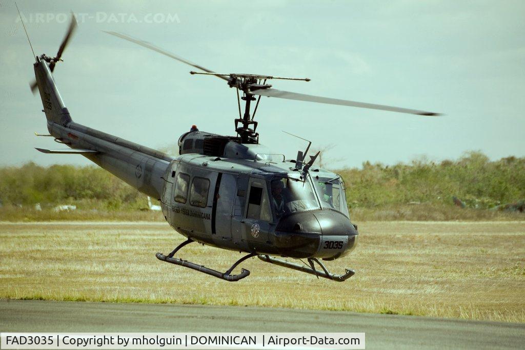 FAD3035, Bell UH-1H Iroquois C/N 11657, Huey taking off at San Isidro Dominican Airforce Base