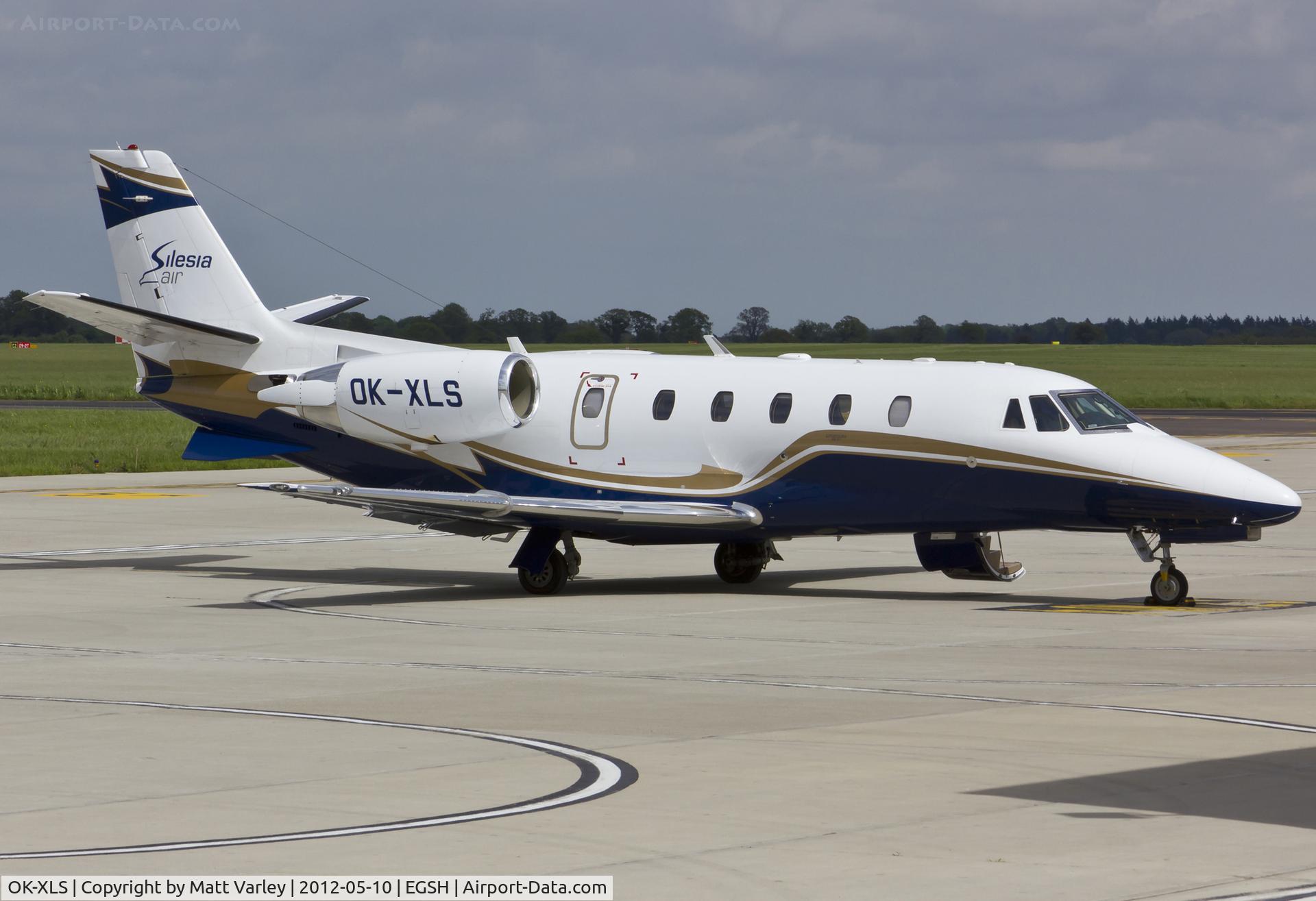 OK-XLS, 2010 Cessna 560XL Citation XLS+ C/N 560-6060, Sat on stand at EGSH.