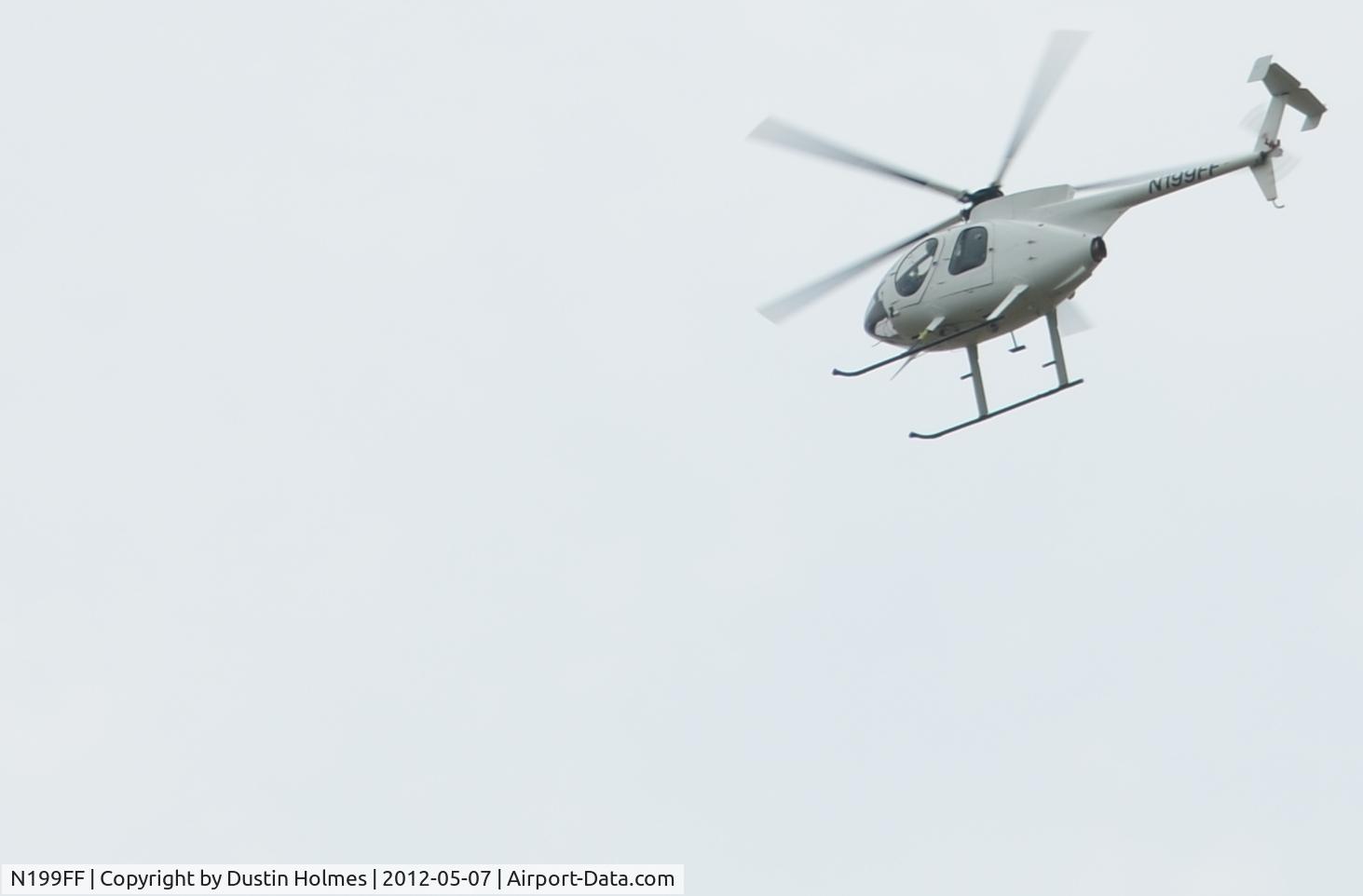 N199FF, 1994 McDonnell Douglas 369FF C/N 0099FF, Taken on May 7, 2012 as it flew over Powhatan Historic State Park in Powhatan, Arkansas.