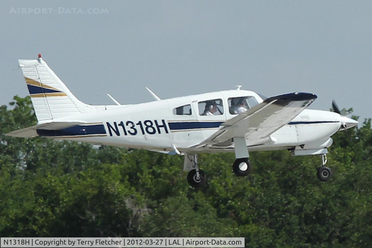 N1318H, 1977 Piper PA-28R-201T Cherokee Arrow III C/N 28R-7703022, At 2012 Sun N Fun