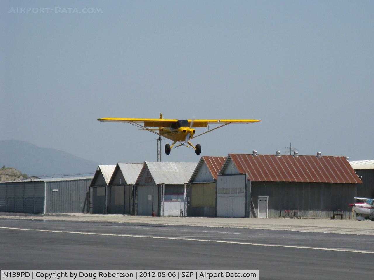 N189PD, Cub Crafters CC11-160 Carbon Cub SS C/N CC11-00189, 2011 Cubcrafters CC11-160 CARBON CUB LSA, Lycoming O-360-based CC340 with O-320 cylinders rated at 180 Hp for 5 minutes, 80 Hp cruise, STOL final approach to Rwy 22L grass with full flaps